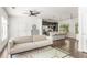 Open concept living room with hardwood floors and modern kitchen at 19 Moda Ln, Atlanta, GA 30316
