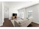 Inviting living room with a comfortable sofa, modern decor, and ample natural light at 19 Moda Ln, Atlanta, GA 30316