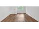 Cozy bedroom featuring natural light and wood floors at 4800 Timberland Sw Dr, Mableton, GA 30126