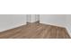 Bedroom with hardwood floors and neutral paint offering a bright and airy feel at 4800 Timberland Sw Dr, Mableton, GA 30126