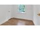 Bedroom with hardwood floors, natural light, and neutral paint at 4800 Timberland Sw Dr, Mableton, GA 30126