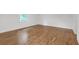 Inviting bedroom featuring hardwood floors and a bright window with a pleasant view at 4800 Timberland Sw Dr, Mableton, GA 30126