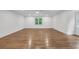 Spacious living room featuring hardwood floors, neutral walls and a ceiling fan with light at 4800 Timberland Sw Dr, Mableton, GA 30126