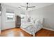 Bedroom with hard wood floors, ceiling fan, and natural light at 1253 Caroline Ne St # 223, Atlanta, GA 30307