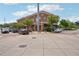Commercial property with red brick, trees, and parking creating a welcoming environment at 1253 Caroline Ne St # 223, Atlanta, GA 30307