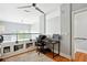 Office loft space with built-in shelving, a ceiling fan, and hardwood floors at 1253 Caroline Ne St # 223, Atlanta, GA 30307