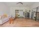 Spacious living area with hardwood floors, a comfortable sofa, and large mirror at 2045 Bethany Spring Trce, Cumming, GA 30041