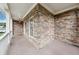 Close up of front porch with stone detail and white railings providing curb appeal at 402 Homestead Dr, Dallas, GA 30157