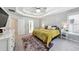 Bright main bedroom features a trey ceiling, ample natural light, and a plush carpeted floor offering comfort and style at 402 Homestead Dr, Dallas, GA 30157