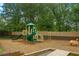 Community playground with slides, play structure, swings and more at 402 Homestead Dr, Dallas, GA 30157