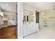 Bathroom boasts a glass enclosed shower and adjacent closet with built-in shelving at 11 Brownson Ct, Acworth, GA 30101