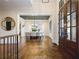 Grand entryway with dark hardwood floors leading to dining room with exquisite natural light at 11 Brownson Ct, Acworth, GA 30101