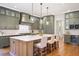Modern kitchen with a large island, pendant lighting, and stylish cabinetry, perfect for cooking and entertaining at 11 Brownson Ct, Acworth, GA 30101