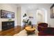 Upstairs living room features seating area, desk, and mounted television at 11 Brownson Ct, Acworth, GA 30101