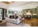 Spacious living room adjacent to a modern kitchen, featuring comfortable seating and stylish accents for a relaxed atmosphere at 11 Brownson Ct, Acworth, GA 30101