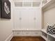 Mudroom with built-in storage, bench, and hardwood floors at 11 Brownson Ct, Acworth, GA 30101