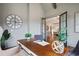 Well-appointed home office showcasing a spacious desk, statement clock, and stylish decor, ready for productivity at 11 Brownson Ct, Acworth, GA 30101