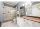Well-appointed bathroom featuring a modern glass shower, stylish vanity, and elegant fixtures, offering a spa-like experience at 2300 Peachford Rd # 2404, Atlanta, GA 30338