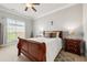Cozy bedroom featuring a comfortable bed, soft carpet, and calming natural light, creating an ideal sleep space at 2300 Peachford Rd # 2404, Atlanta, GA 30338