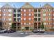 Attractive brick condominium building with private balconies and reserved parking spaces at 2300 Peachford Rd # 2404, Atlanta, GA 30338