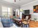 Living room featuring natural light, hardwood flooring, and modern décor for comfortable and stylish living at 2300 Peachford Rd # 2404, Atlanta, GA 30338