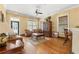 Comfortable living room with hardwood floors, ceiling fan, and stylish furniture at 2300 Peachford Rd # 2404, Atlanta, GA 30338