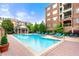 Inviting pool with lounge chairs and lush landscaping, ideal for relaxation at 2300 Peachford Rd # 2404, Atlanta, GA 30338