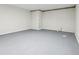 Basement area showing concrete floors, ideal for storage or future renovation at 245 London Ln, Hiram, GA 30141