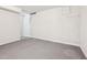Unfinished basement with concrete floors, showing walls that are ready for renovation and design at 245 London Ln, Hiram, GA 30141