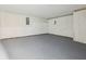 Unfinished basement area showcasing concrete floors, ideal for customization and storage at 245 London Ln, Hiram, GA 30141