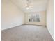 Spacious bedroom featuring vaulted ceiling, carpet and natural light at 245 London Ln, Hiram, GA 30141