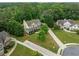 Aerial shot of a home with mature trees, a large yard, and a long driveway at 360 Glade Knoll Trail Trl, Fayetteville, GA 30215