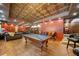 Finished basement with a pool table, bar area, and comfortable seating at 360 Glade Knoll Trail Trl, Fayetteville, GA 30215