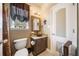 Well-lit bathroom with a granite-top vanity and decorative fixtures at 360 Glade Knoll Trail Trl, Fayetteville, GA 30215