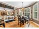 Bright breakfast nook with hardwood floors and natural lighting at 360 Glade Knoll Trail Trl, Fayetteville, GA 30215