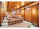 A cozy home theater setup with comfortable seating and warm, ambient lighting at 360 Glade Knoll Trail Trl, Fayetteville, GA 30215