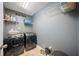 Well-organized laundry room with modern washer and dryer at 360 Glade Knoll Trail Trl, Fayetteville, GA 30215