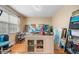 Bright studio space with a large work island, natural light, and hardwood floors at 360 Glade Knoll Trail Trl, Fayetteville, GA 30215