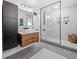 Modern bathroom featuring a glass-enclosed shower, floating vanity, and stylish tile work at 545 Matterhorn Way Way, Alpharetta, GA 30022