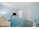 Bright bedroom with a large window and light blue walls at 545 Matterhorn Way Way, Alpharetta, GA 30022