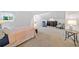 Large bedroom with sitting area and neutral carpet at 545 Matterhorn Way Way, Alpharetta, GA 30022