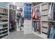 Organized walk-in closet with custom shelving and ample storage space at 545 Matterhorn Way Way, Alpharetta, GA 30022