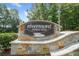 Stone entrance sign to Rivermont Fairway Ridge at 545 Matterhorn Way Way, Alpharetta, GA 30022