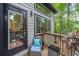 Relaxing outdoor deck with stylish seating, wooded views, and a tranquil ambiance at 545 Matterhorn Way Way, Alpharetta, GA 30022