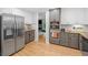 Modern kitchen featuring stainless steel appliances and light wood floors at 545 Matterhorn Way Way, Alpharetta, GA 30022