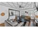 Spacious living room showcasing hardwood floors, coffered ceilings, and an open layout at 1186 Lincoln Dr, Marietta, GA 30066