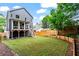 Spacious backyard with newly installed wooden fence and plenty of green grass at 2493 Oostanaula Ne Dr, Brookhaven, GA 30319
