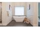 Bright bathroom showcasing a freestanding tub, natural light, and stylish decor at 2493 Oostanaula Ne Dr, Brookhaven, GA 30319