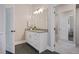 Well-lit bathroom displaying a vanity with storage at 2493 Oostanaula Ne Dr, Brookhaven, GA 30319