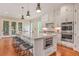 Elegant kitchen with a large island, double ovens, and stainless steel appliances at 2493 Oostanaula Ne Dr, Brookhaven, GA 30319